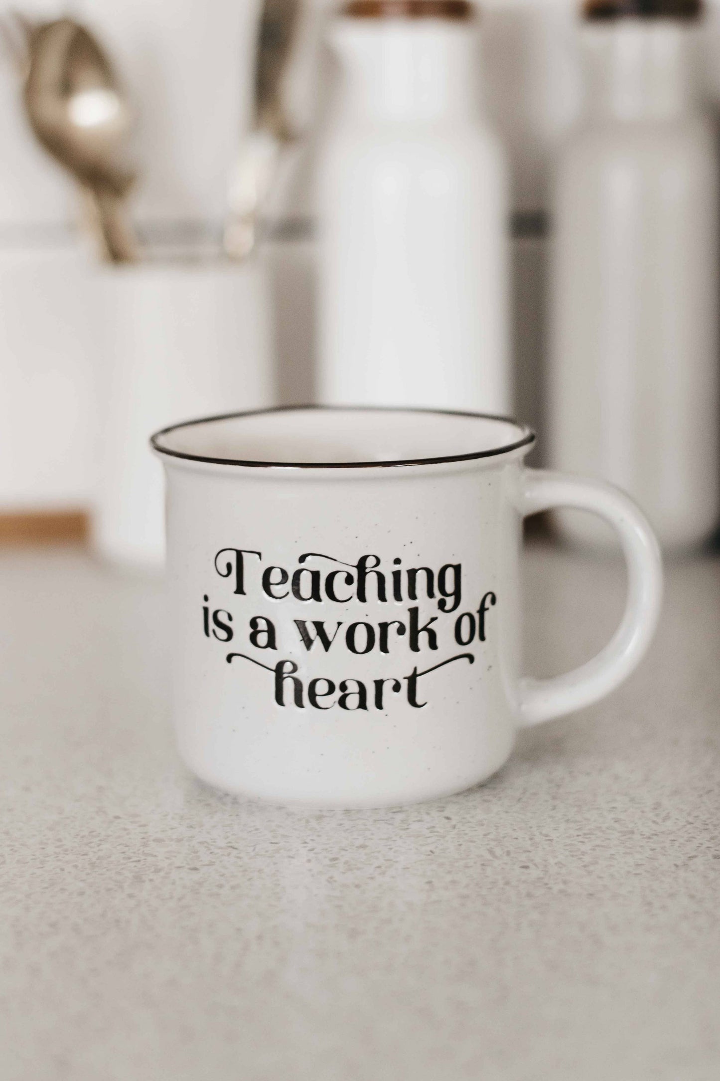 Teaching is a work of heart Mug